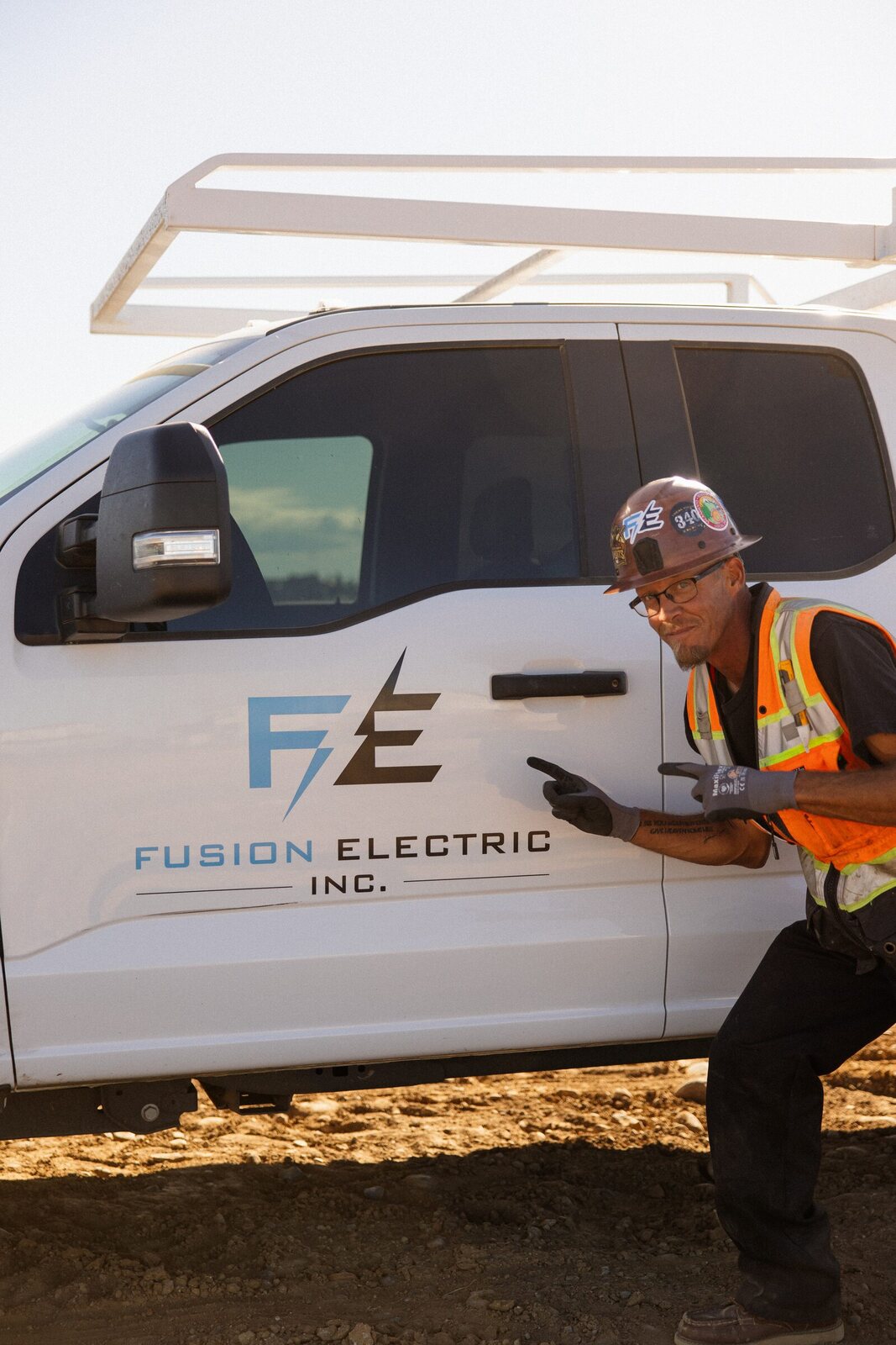 Fusion Electric crew member at the branded service van