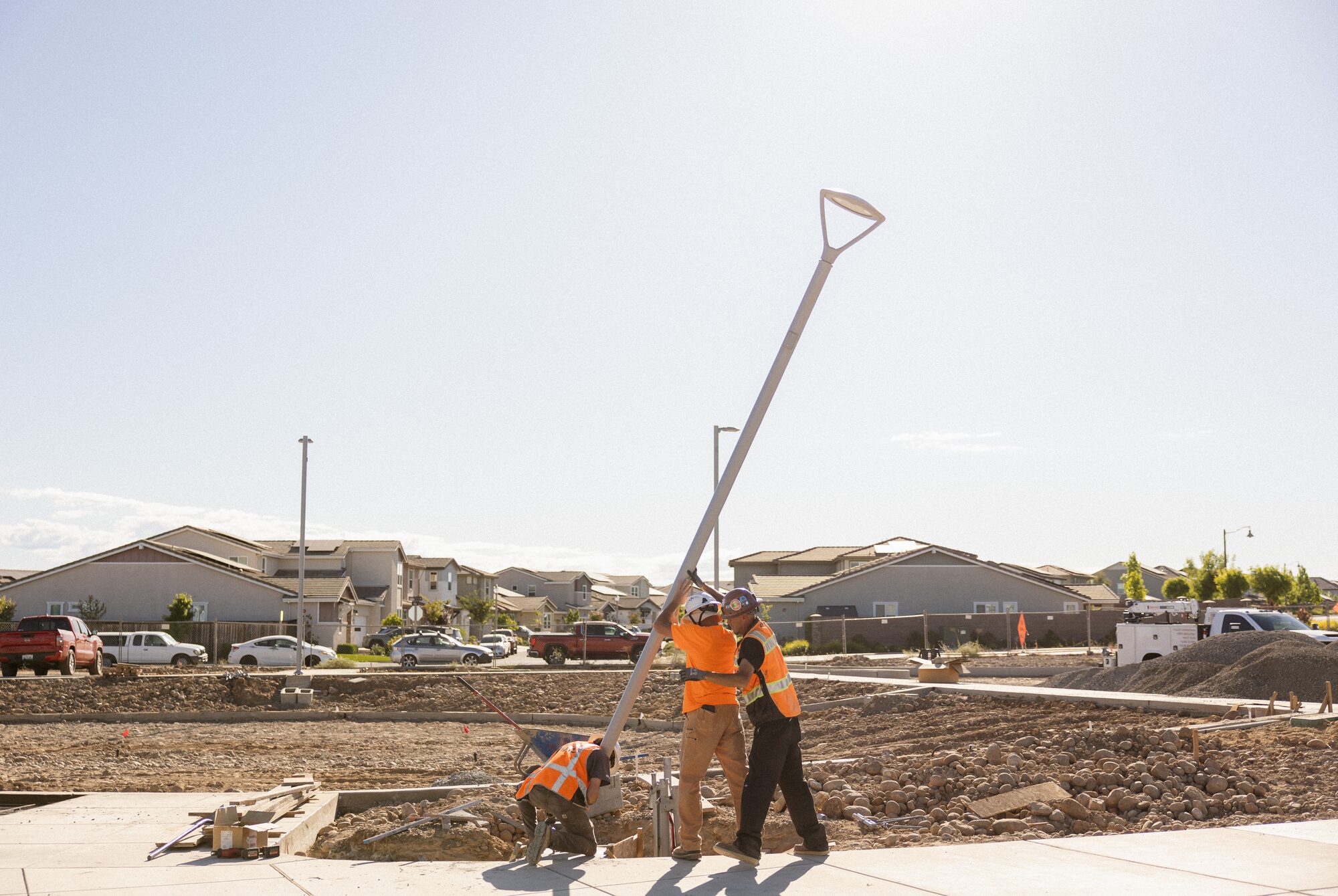 Fusion Electric crew installing a streetlight pole on a public infrastructure project